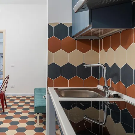 Iris E Petros * Syracuse